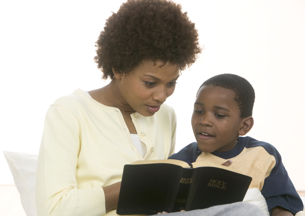 Mother and Son Reading Bible Together